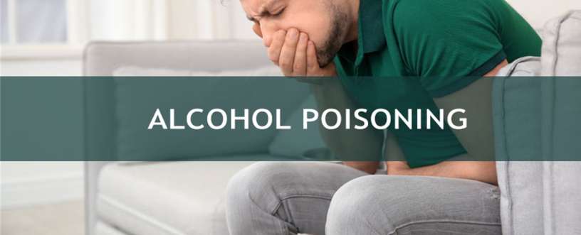 A person with alcohol poisoning covering his mouth