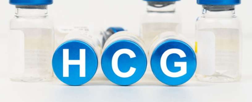 HCG written with a vaccine behind it