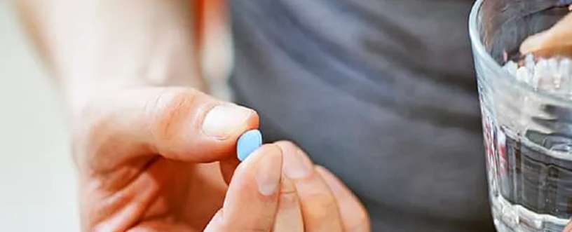 Hand holding tadalafil medicine​