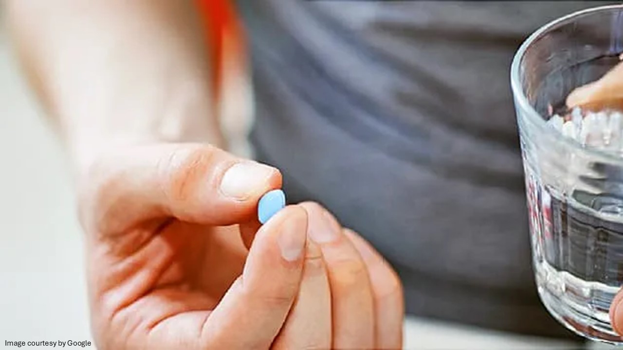 Hand holding tadalafil medicine​