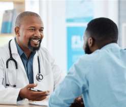 Doctor talking patient