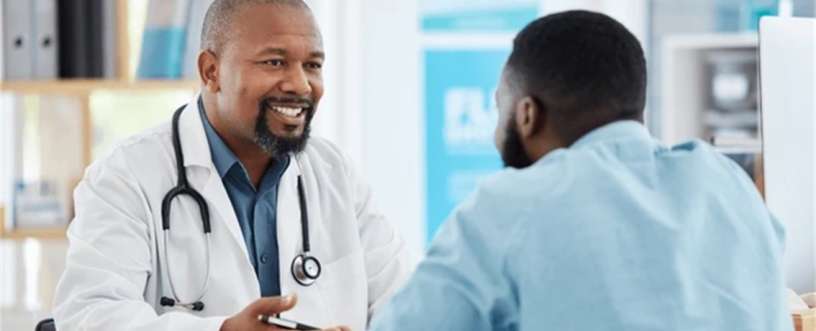 Doctor talking patient