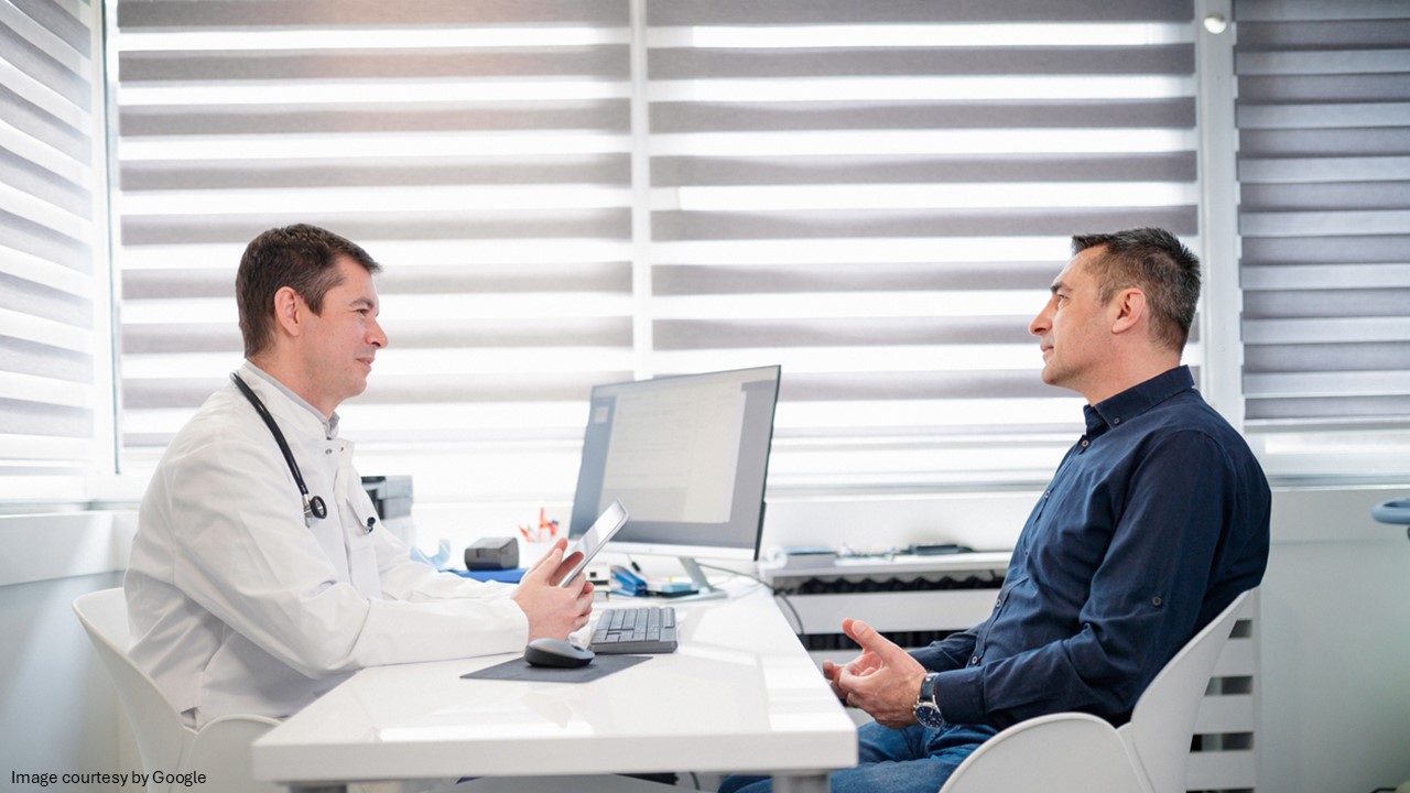 Doctor discussing  about Vardenafil and Tadalafil to a patient 