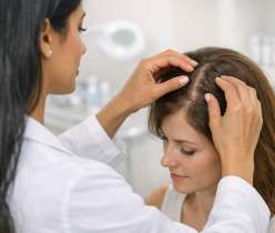 doctor treating Scalp acne