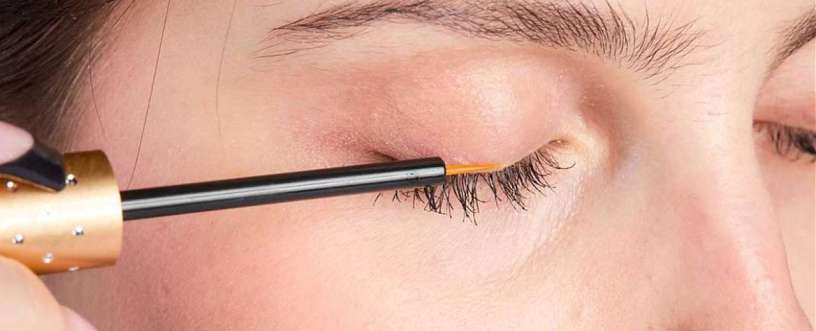 women applying careprost
