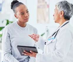 doctor consulting patient suffering from acidity